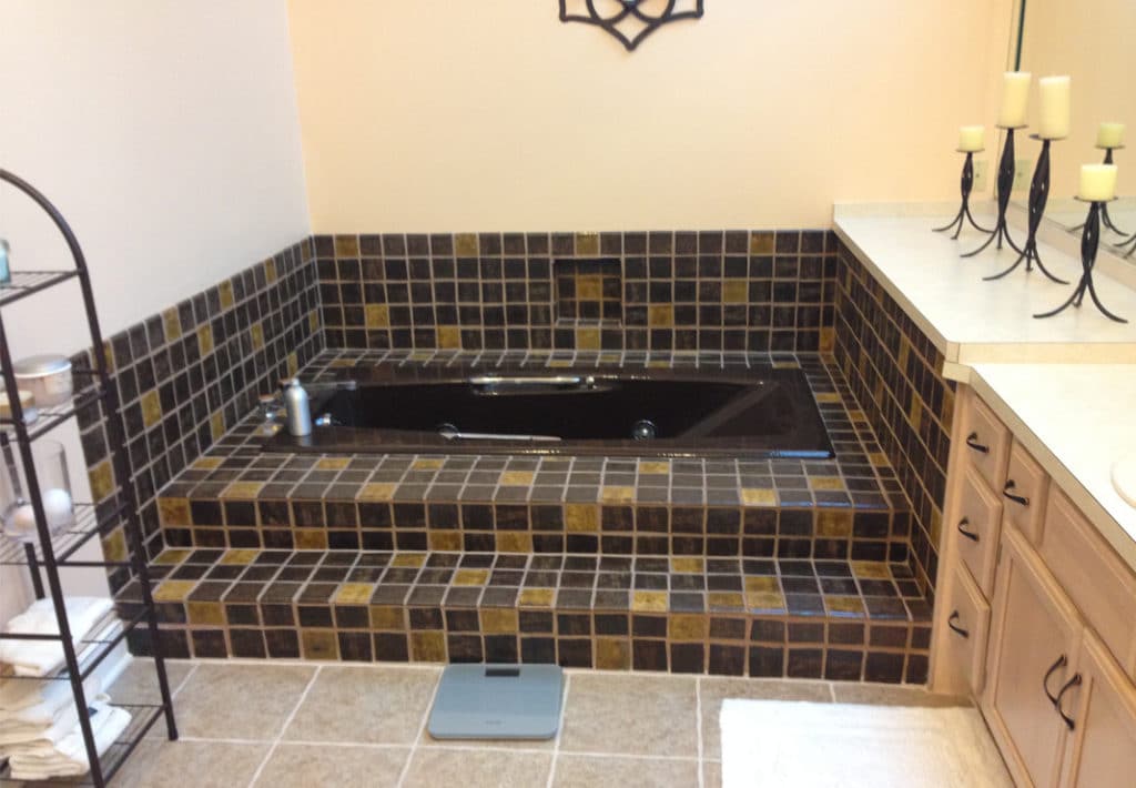 Dark Bathroom Tile and Tub - Before Photo