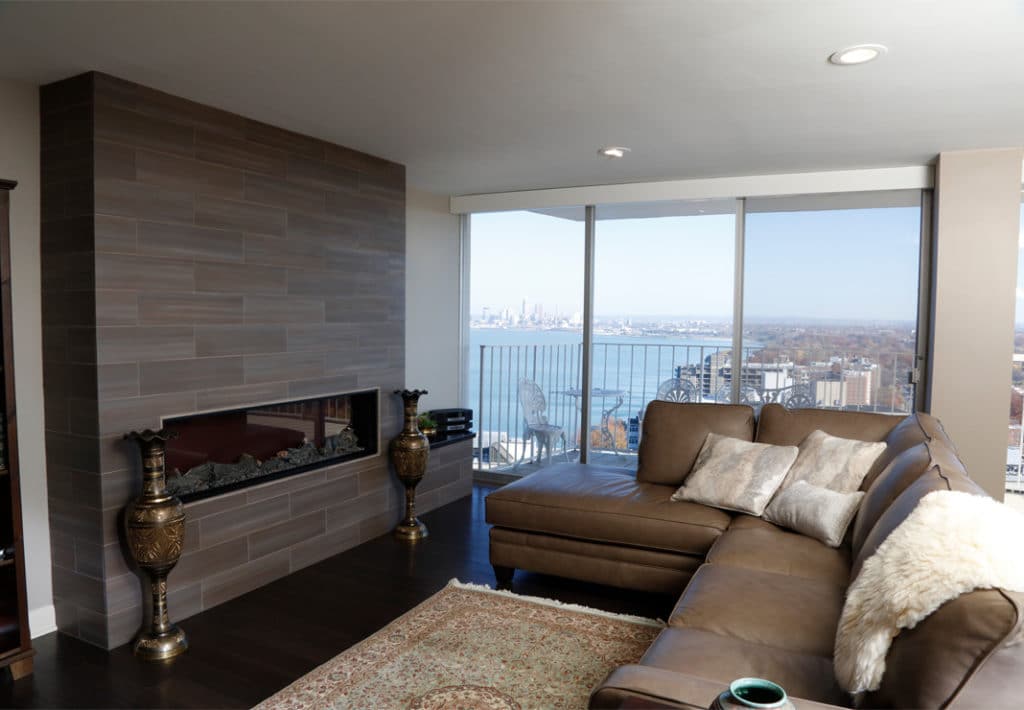 Linear electric fireplace with beautiful downtown Cleveland city view in background