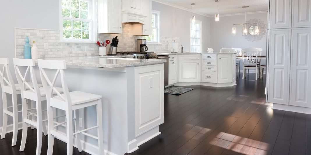 Bright Open Kitchen Leading into Dining Room