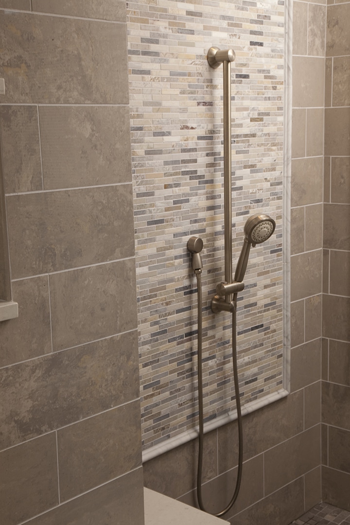 Accent tile inlay in custom shower room