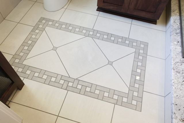Decorative tile floor in bathroom