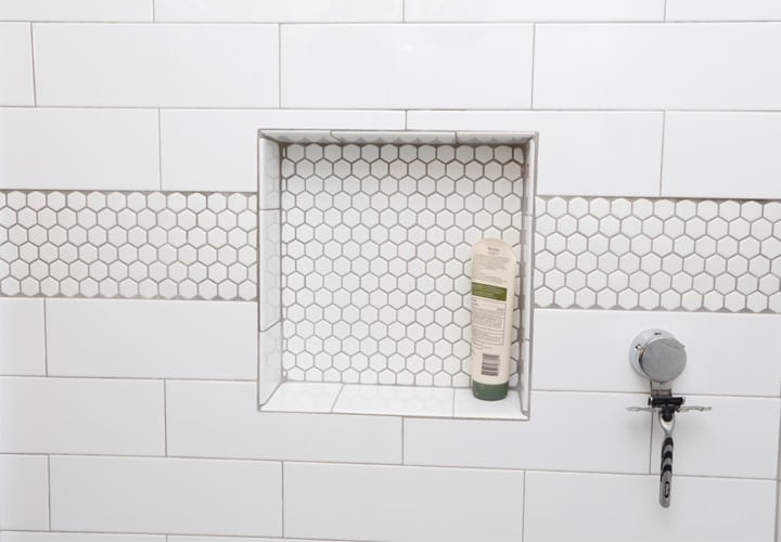 Penny Tile Accents in Shower 