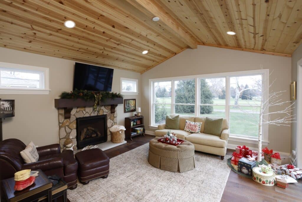 remodeled fireplace with wood ceiling