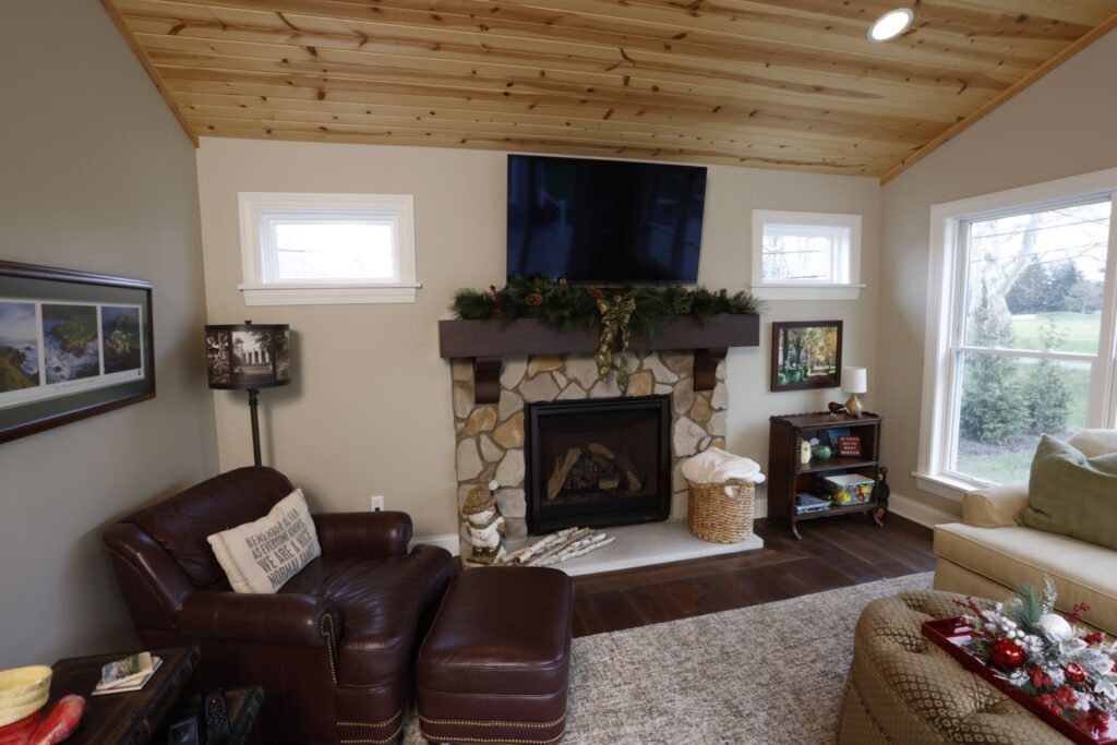 great room with stone fireplace