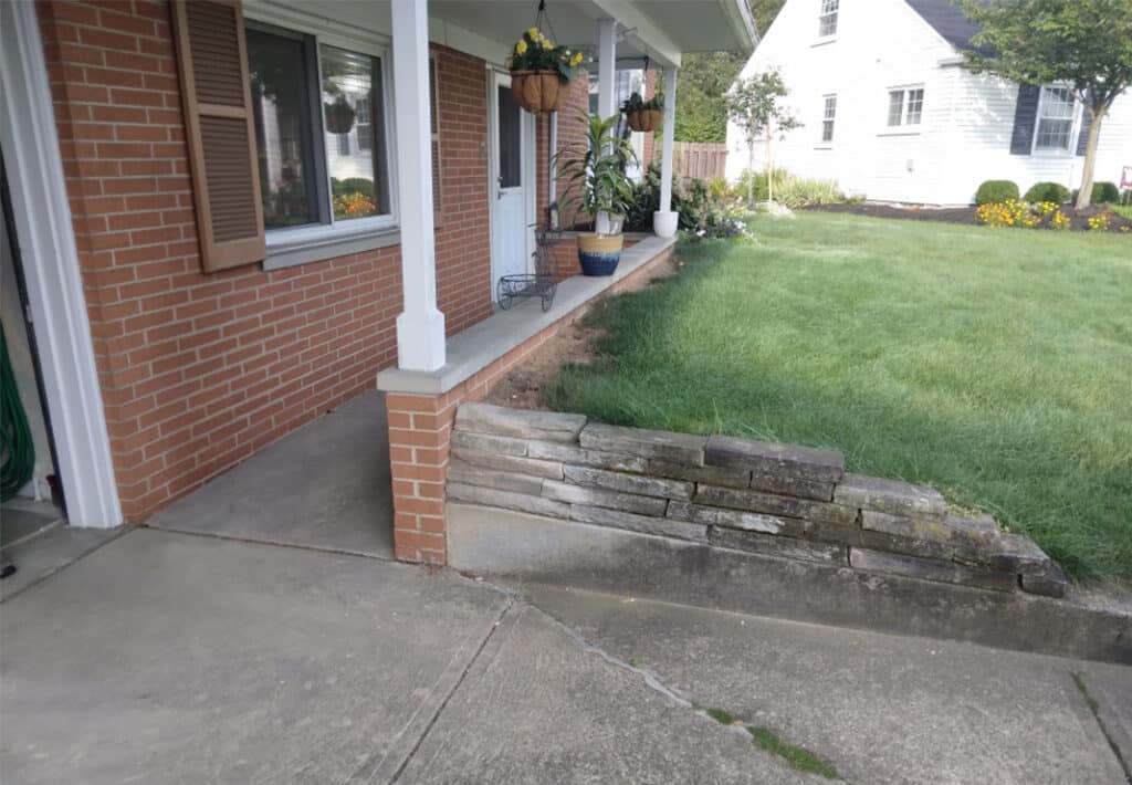 Before: Small Patio Walkway Retaining Wall